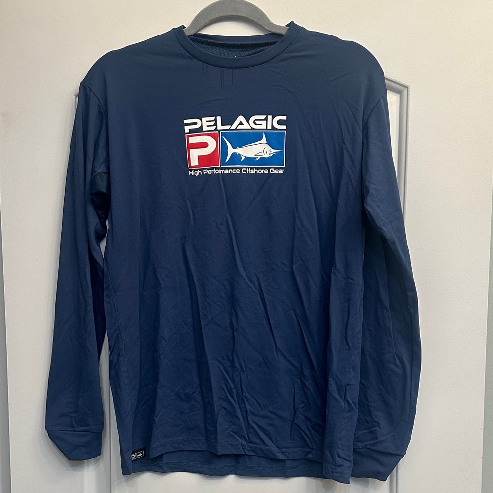 Pelagic Navy Blue Long Sleeve Shirt with Red, White, and Blue Logo